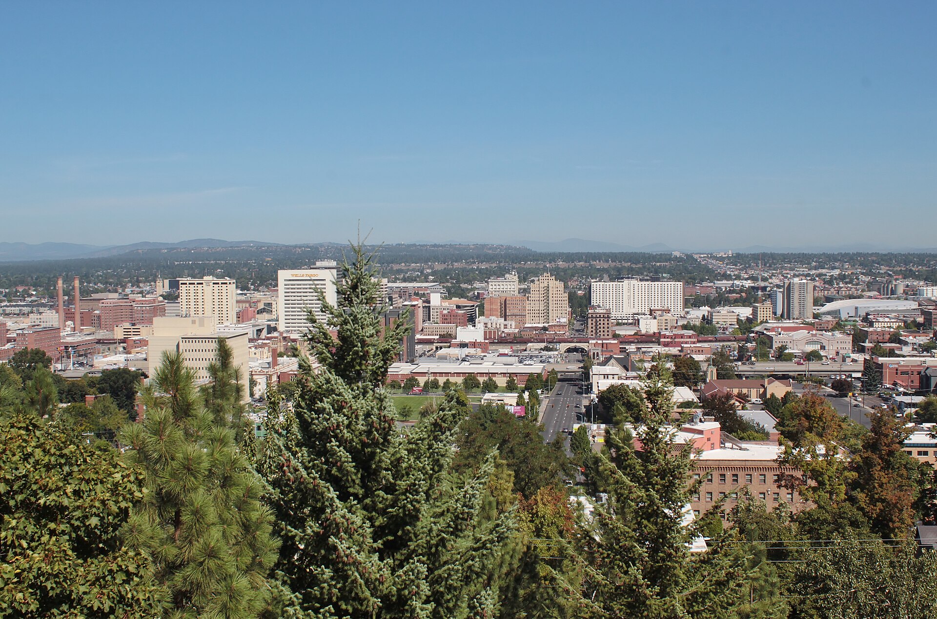 Downtown Spokane and surrounding hills seen from above Edwidge Woldson Park